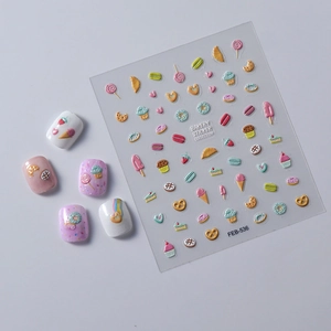 Detail of 5D embossed bakery nail stickers featuring macarons and ice cream cones