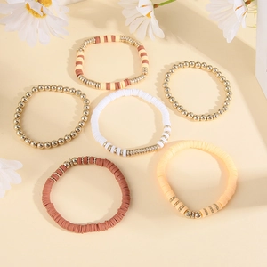 Close-up of Bohemian 6-piece bracelet set with colorful Heishi clay beads and metal beads