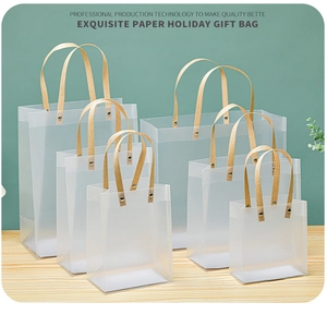 Frosted PP gift bags with wood-grain handles and metal rivets in various sizes