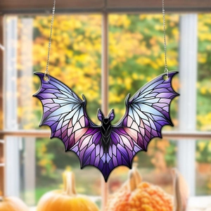 Gothic bat suncatcher with purple gradient acrylic wings hanging on a window