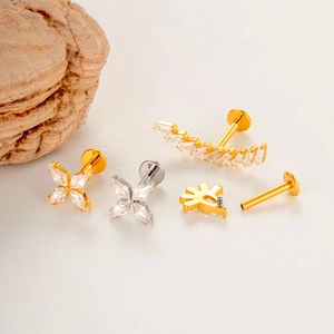 G23 titanium labret studs set with zircon cross and curved fan designs for piercing
