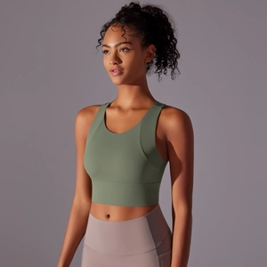 Side view of olive green sports bra with wide straps and high-stretch fabric for yoga