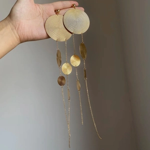 Gold geometric round textured earrings with elegant metal tassel drops for women