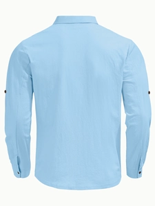 Rear view of a men's light blue cotton linen shirt showing fabric texture and back seam details