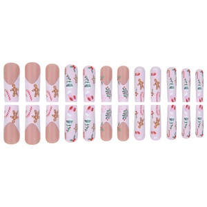 Christmas coffin press-on nails featuring gingerbread man and tree patterns