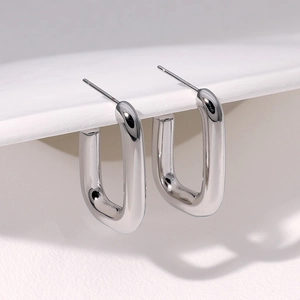 Minimalist silver U-shaped stainless steel hoop earrings for women with high-polished finish