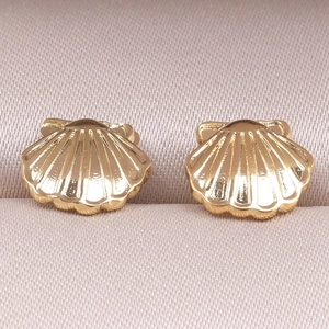 Macro shot of gold-plated 304 stainless steel shell stud earrings with realistic textures
