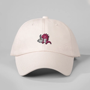 Adjustable light pink baseball cap with cute embroidered dinosaur holding coffee