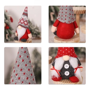 Detailed view of handmade knitted Christmas gnome plush with festive patterns and textures