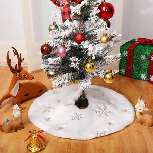 White plush Christmas tree skirt with gold snowflake embroidery for holiday home decoration