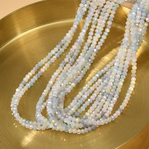 Faceted 3mm multi-color ice cream pastel beads in gold metal tray for DIY jewelry