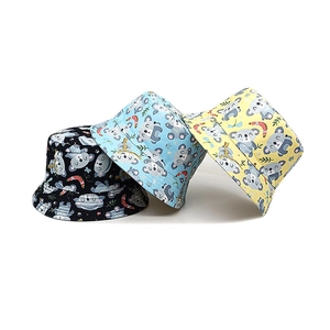 Kids koala print bucket hats in black blue and yellow with reversible cotton fabric design