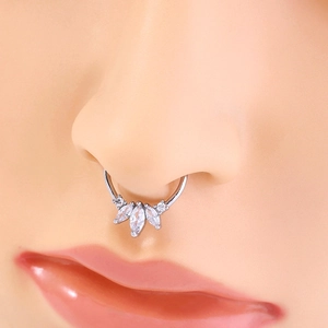 Detailed view of silver non-pierced septum ring set with marquise and round cubic zirconia