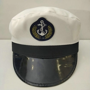 Detail of nautical captain hat with anchor embroidery and glossy black visor