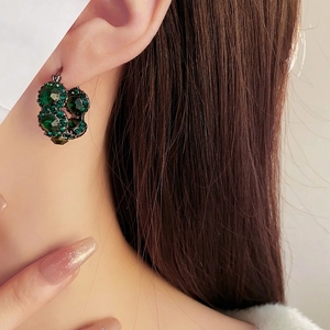 French retro emerald green crystal huggie hoop earrings with black gold finish