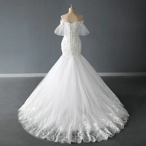 Elegant off-shoulder mermaid wedding dress with lace puff sleeves and long sequined train