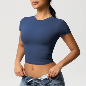 Close-up of tight-fit navy blue cropped yoga shirt with high-elasticity knit fabric