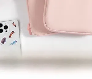 Detail of pink waterproof PU leather iPad sleeve showing reinforced stitching and durable zipper