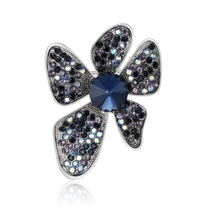 Elegant vintage butterfly brooch with blue rhinestones and crystals on silver metal base