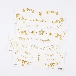 Metallic gold temporary tattoo set with butterfly and star patterns for face and eyes