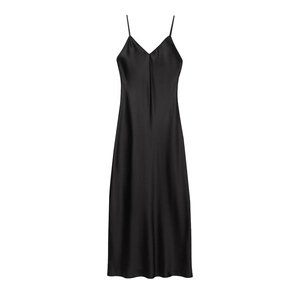 Detail of black silk satin slip dress showing smooth texture and V-neckline finish