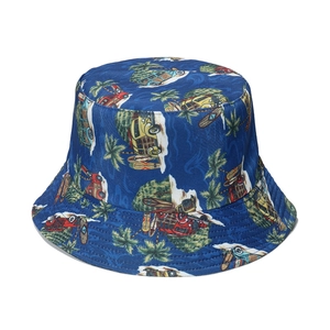 Blue canvas bucket hat with tropical palm tree and vintage van surf print for summer