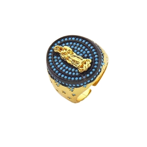 Golden open ring with Maria portrait on turquoise-beaded black round face and carved band