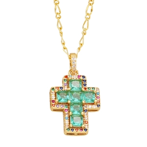 Cross necklace in gold finish with vibrant colorful cubic zirconia and green center stone