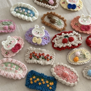 Handmade crochet hair clips with cute flower, rabbit, and cherry designs for children