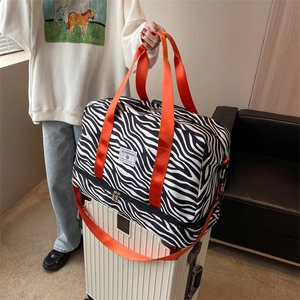 Sac de voyage yoga à motif zébré avec sangles orange et compartiment inférieur séparé