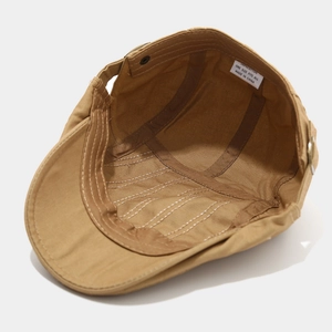 Close-up of the internal stitching and 100% cotton material label on this ivy cap