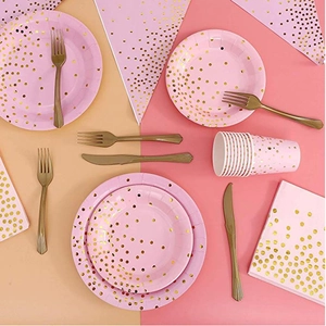 Pink and gold polka dot party tableware set including paper plates cups and napkins