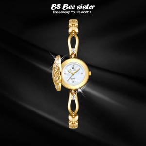 Elegant gold quartz flip bracelet watch with camellia floral rhinestones on black satin