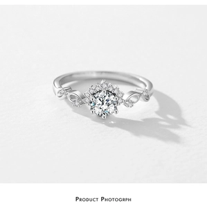 Close-up of S925 silver ring featuring infinity band and crown-set zircon stone