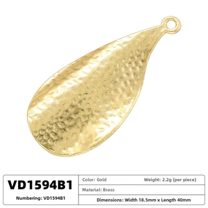 Detailed view of 18.5x40mm gold hammered brass teardrop pendant with dimensions and weight