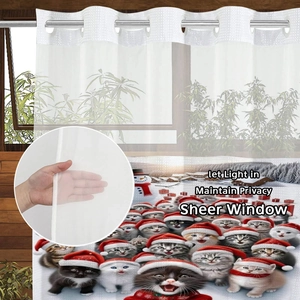 Detailed view of semi-transparent Christmas curtain with cat prints and metal grommets