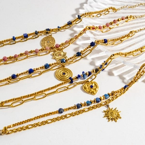 Double-layered gold necklace set with natural lapis lazuli beads and sun heart pendants