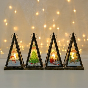 Detailed view of four lighted bronze Christmas lanterns with festive character illustrations