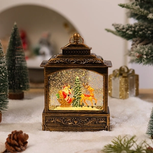 Close-up of vintage bronze Christmas lantern with Santa and elk inside a snow globe