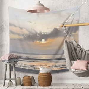 Detail of artistic sunset oil painting tapestry on a textured wall in a cozy room decor