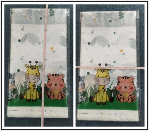 Jungle safari animal party tablecloth folded dimensions 30cm by 18cm with measuring tape