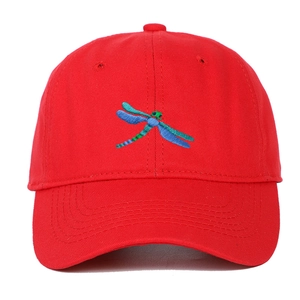 Detailed blue dragonfly embroidery on a red soft-top cotton twill baseball cap