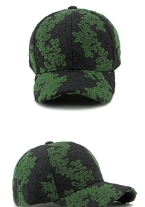 Macro detail of ethnic jacquard embroidery and floral texture on a baseball cap