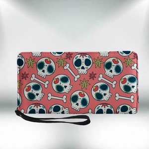 Pink PU leather long wallet with sugar skull and floral print featuring a black wrist strap