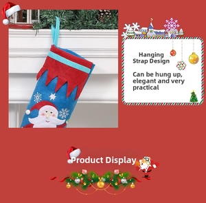 Detail of dark blue Christmas stocking with Santa Claus applique and red serrated trim
