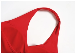 Detailed view of red V-neck halter yoga vest with high-quality flatlock stitching