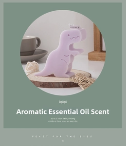 Detail of a cute purple dinosaur-shaped scented candle with textured scales and label