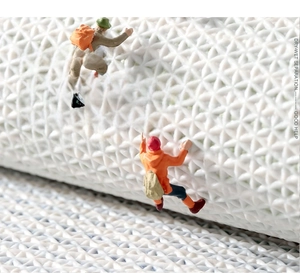 Detail of white TPR non-slip backing with triangle texture for modern floor mats