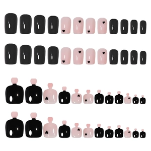 Glossy black and pink heart pattern press-on nail set for fingers and toes in matrix layout