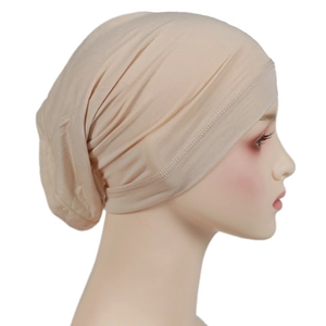 Detail of light beige modal hijab cap showing high elasticity and smooth fabric texture